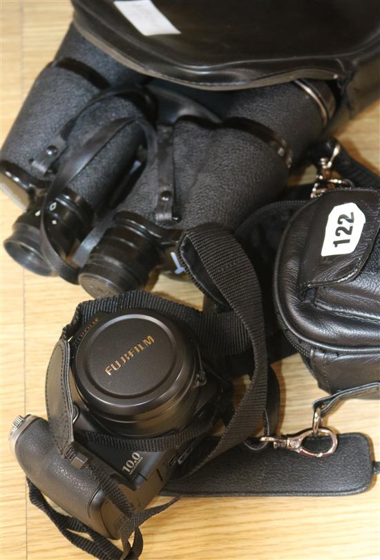 A pair of binoculars and camera